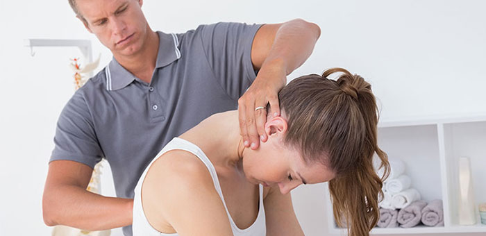 Woman receiving chiropractic adjustment from a San Ramon chiropractor