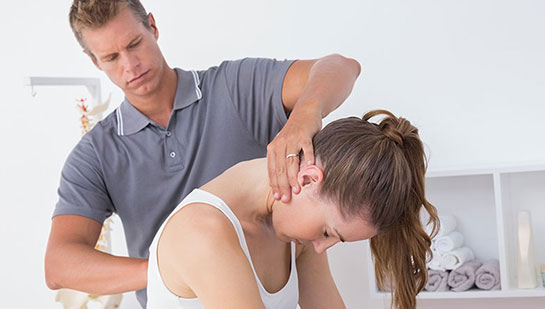 Woman receiving chiropractic adjustment from a San Ramon chiropractor