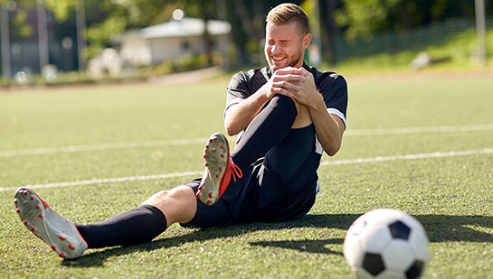 Soccer player suffering sports injury before chiropractic treatment from San Ramon chiropractor