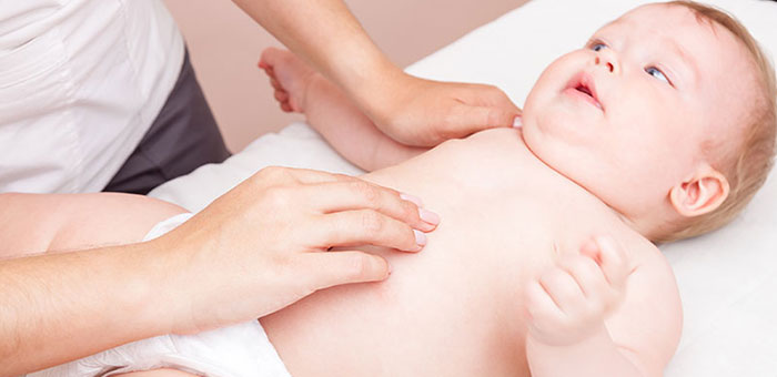 Baby receiving chiropractic adjustment to relieve colic from San Ramon chiropractor