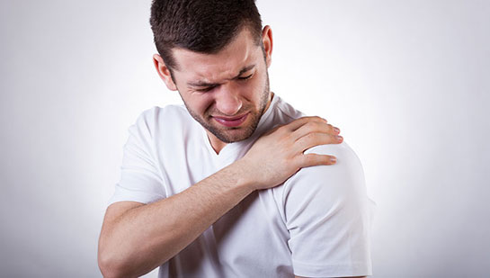 Man suffering from frozen shoulder before visiting San Ramon chiropractor