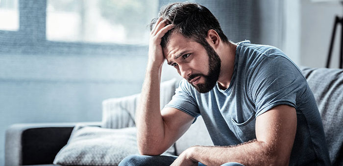 Man struggling with stress before seeking San Ramon chiropractor