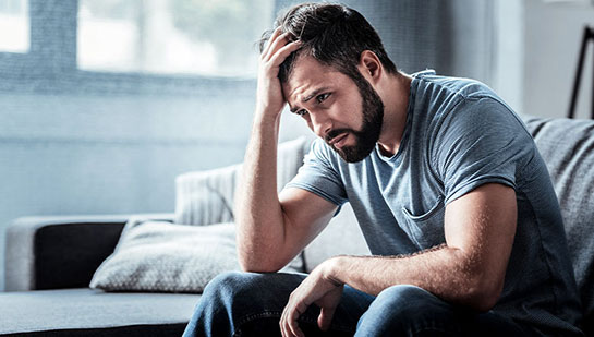Man struggling with stress before seeking San Ramon chiropractor