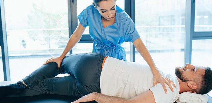 Patient receiving sciatica treatment from San Ramon chiropractor